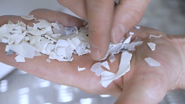 white-reject-plastic-in-hand